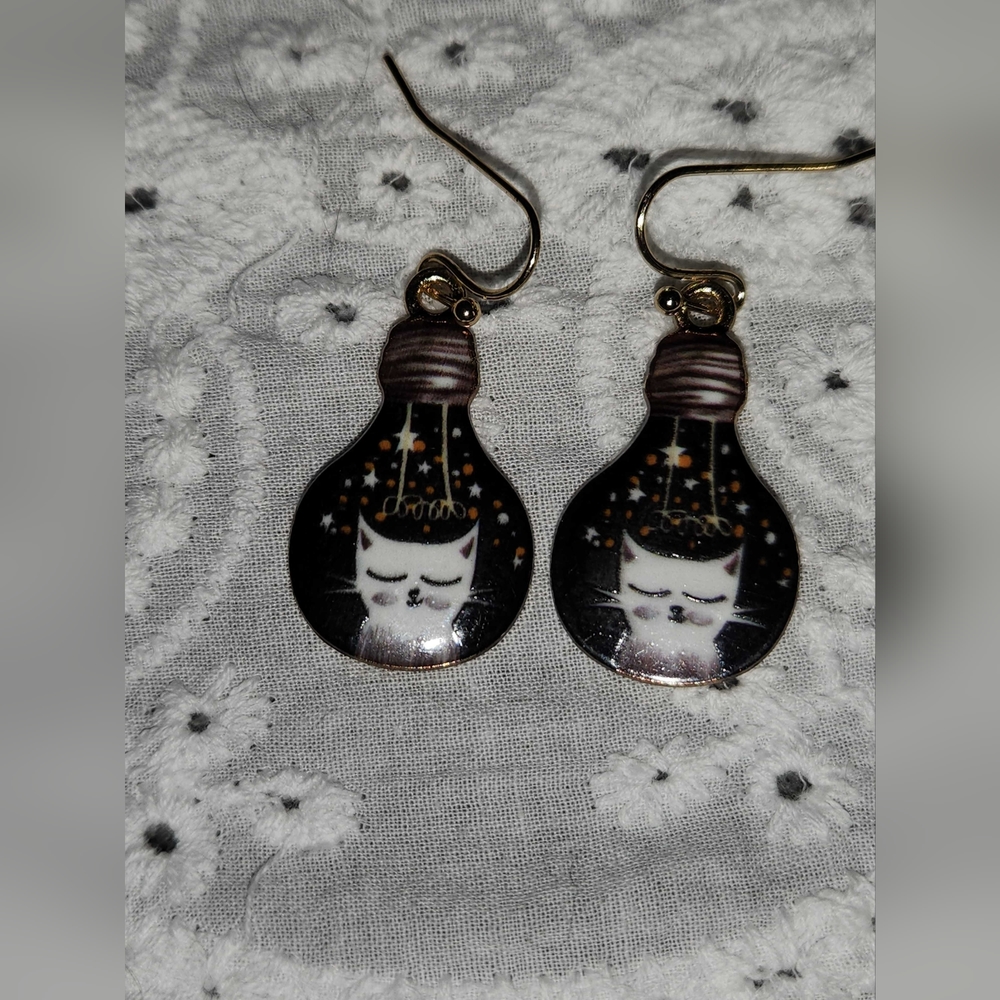 A set of night sky kitty earrings hand crafted